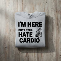 Load image into Gallery viewer, I'm Here but I Still Hate Cardio Hoodie